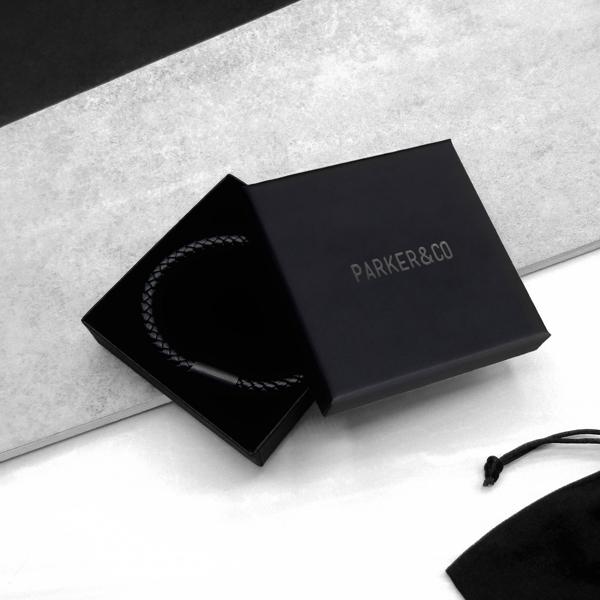 Premium black gift box with "PARKER&CO" logo, luxury packaging for men's accessories or jewelry, sleek matte design ideal for high-end branding and unboxing experience.